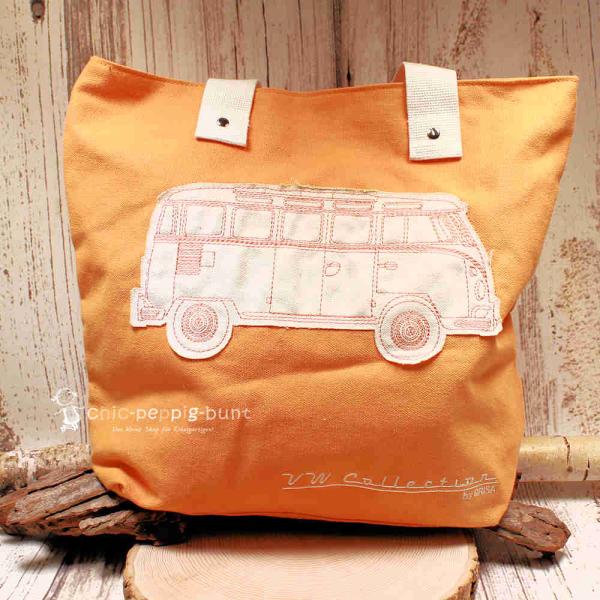Orangefarbene VW T1 Einkaufstasche aus Segeltuch mit Bulli-Motiv und Reißverschluss in der Vorderansicht.