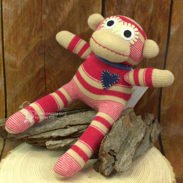 Sockenaffe Stofftier mit rot Farben Sockenaffe Stofftier mit rot Farben