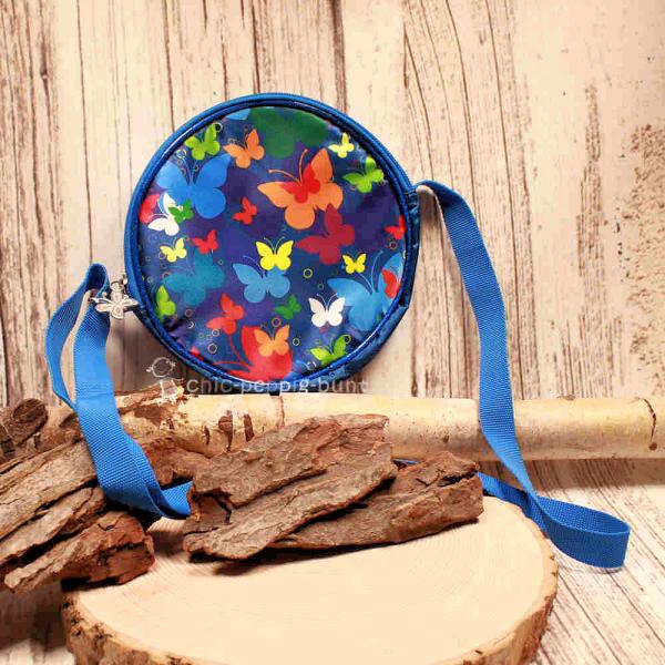 Umhängetasche blau Kinder rund bunte Schmetterlinge