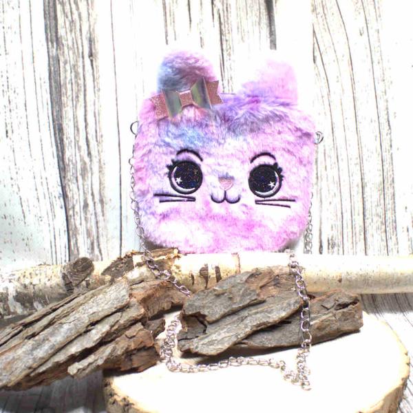 Flauschige lila-rosa marmorierte Umhängetasche für Kinder mit funkelnder Glitzer-Schleife und silberner Metallkette.