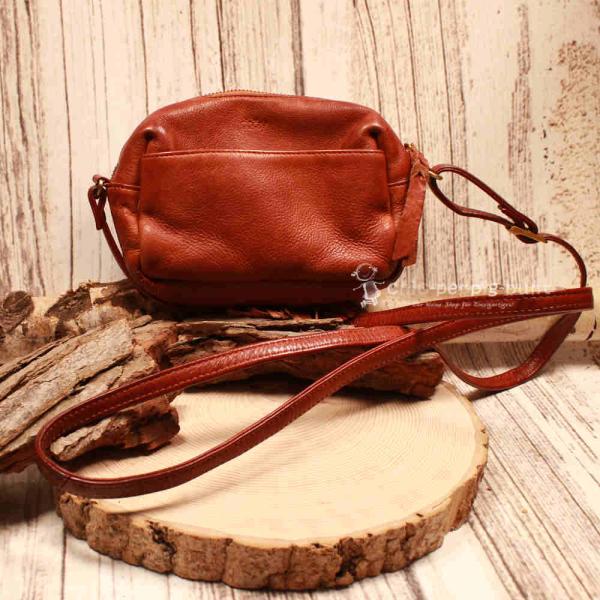 Umhängetasche Leder braun 4 Fächer Quaste