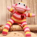 Gestreifter Sockenaffe Midi von HickUps in Rosa, Pink und Gelb, handgefertigte Stoffpuppe aus Fair Trade Produktion.