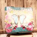 Große türkise Shoppertasche aus Kunstleder mit sichtbarem pinken Innenfutter, langem Schulterriemen und Reißverschlussfach auf hellem Hintergrund.